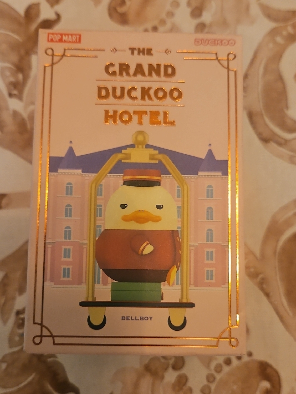 POP MART Grand Duckoo Hotel Bellboy Figure - Pink Bellboy Collectible